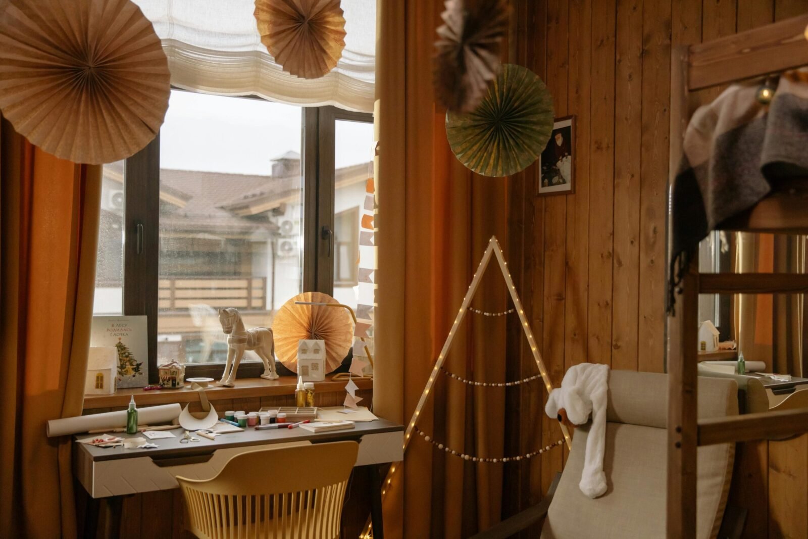 Warm wooden room interior featuring creative decor elements and natural light.